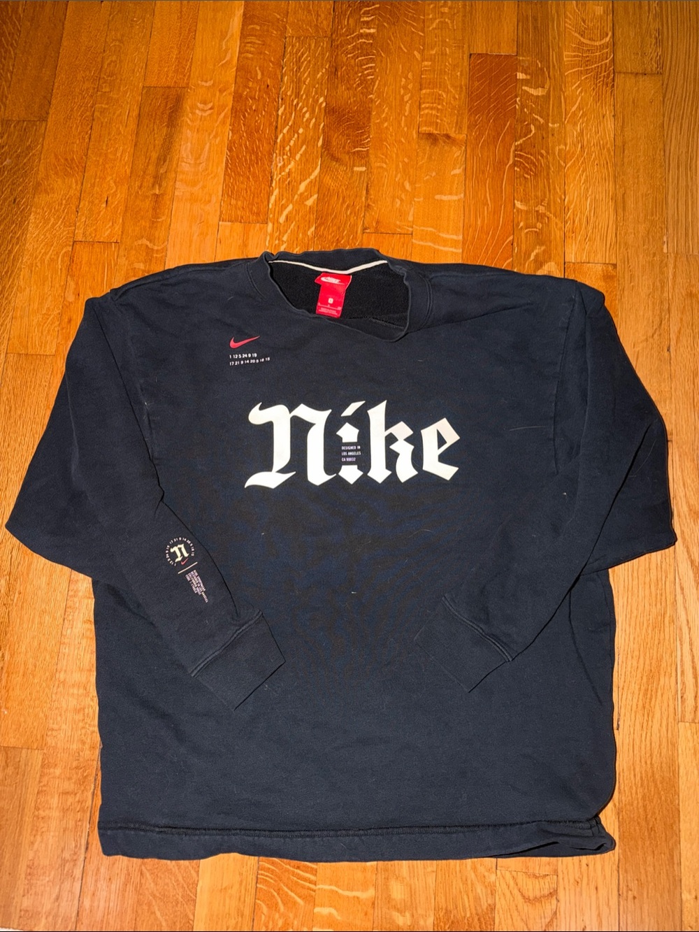 Nike Black Sweatshirt with White Gothic Logo and Red Accents